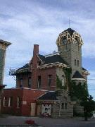 The Old Bathurst Post Office Provincial Historic Site is a masonry building reflecting the influence of the Romanesque style, it is located at the corner of Main and Douglas Street in the downtown core at 96 Main Street, City of Bathurst. 